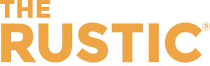 The Rustic restaurant logo in bold golden-orange letters on a white background