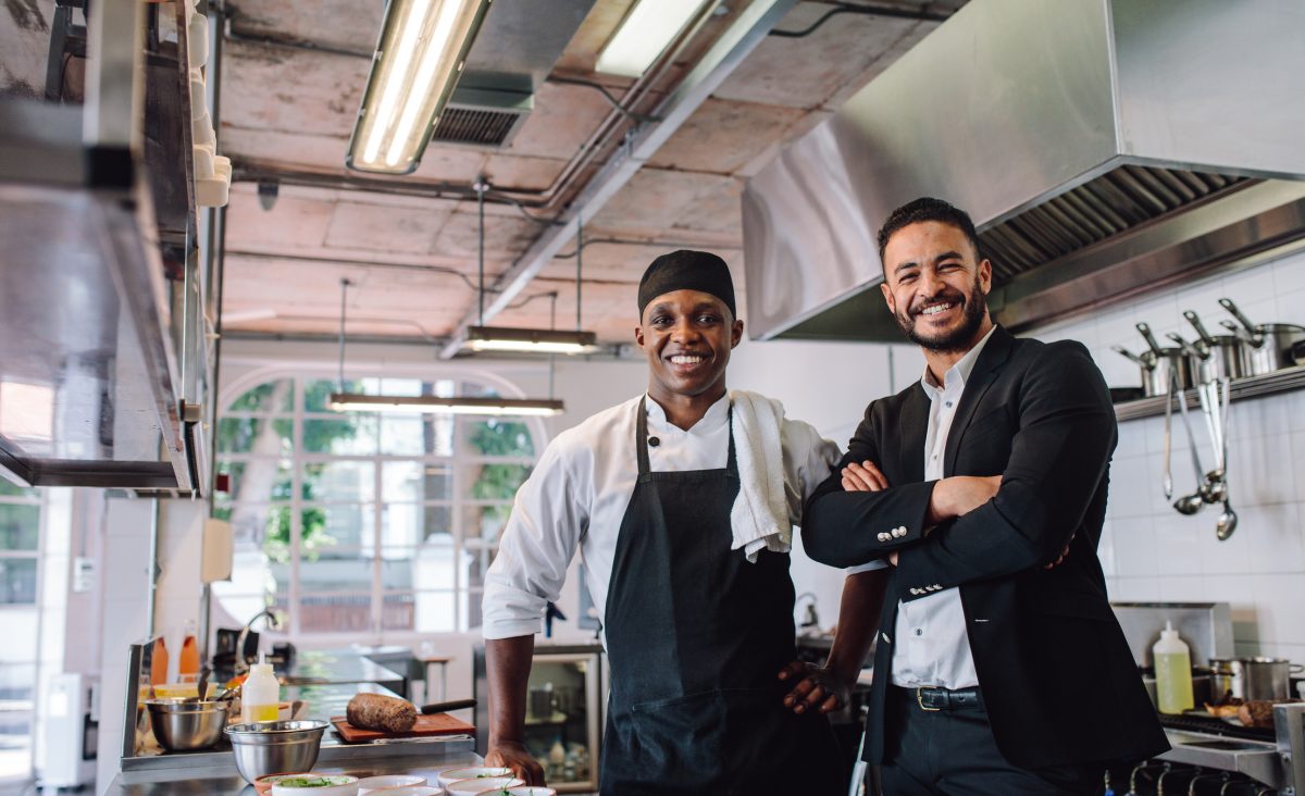 chef and owner in kitchen